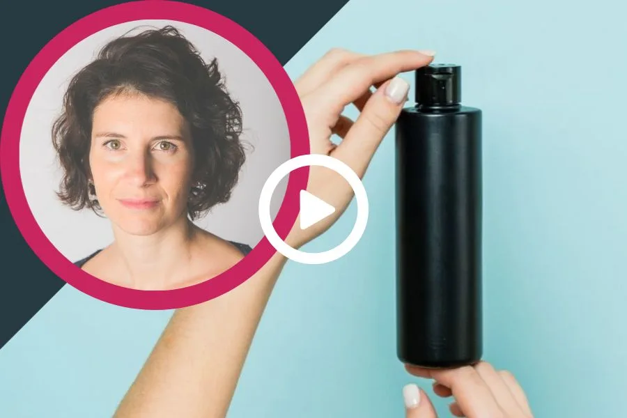 A woman's face next to a bottle of lotion. 